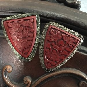 Early 1900s beautiful carved cinnabar dress clips.